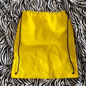Yellow drawstring bag